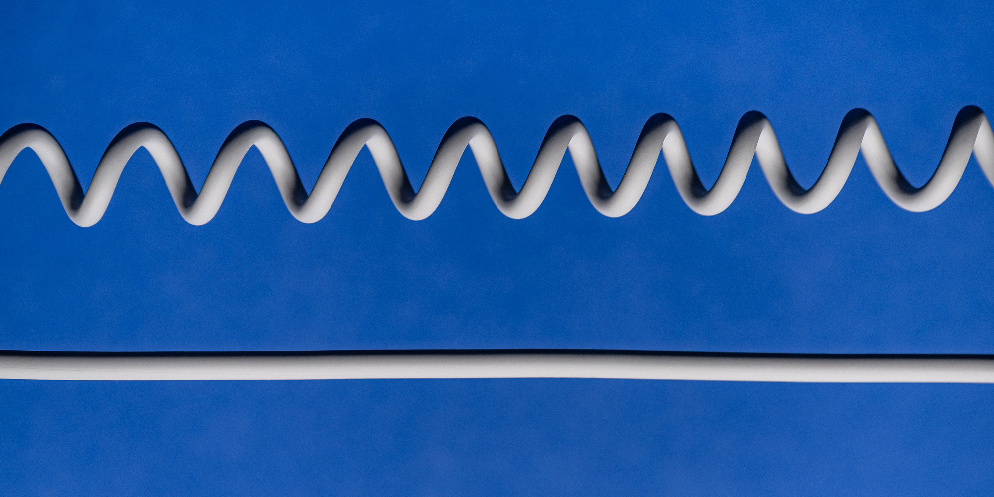 Kabel Newell USB-C - USB-C 100 W, 1,5 m, silikonowy, spiralny, szary